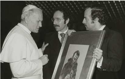 Blessed Pope John-Paul II receiving a gift of the drawing "Brother Florian Playing the Recorder," Tyniec Abbey, Poland, from the artist Stanley Roseman and his colleague Ronald Davis, Vatican, 1979.
