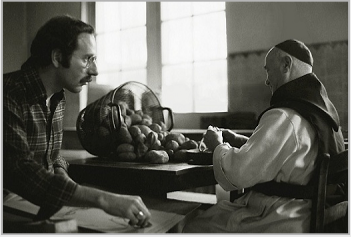 Stanley Roseman drawing a Belgian Trappist monk in the kitchen.  Photo by Ronald Davis.