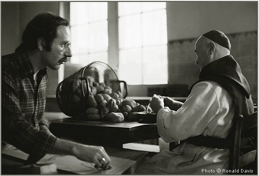 Stanley Roseman drawing a Belgian Trappist monk in the kitchen.  Photo by Ronald Davis